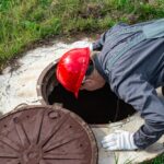 A,Male,Plumber,Opened,The,Hatch,Of,A,Water,Well